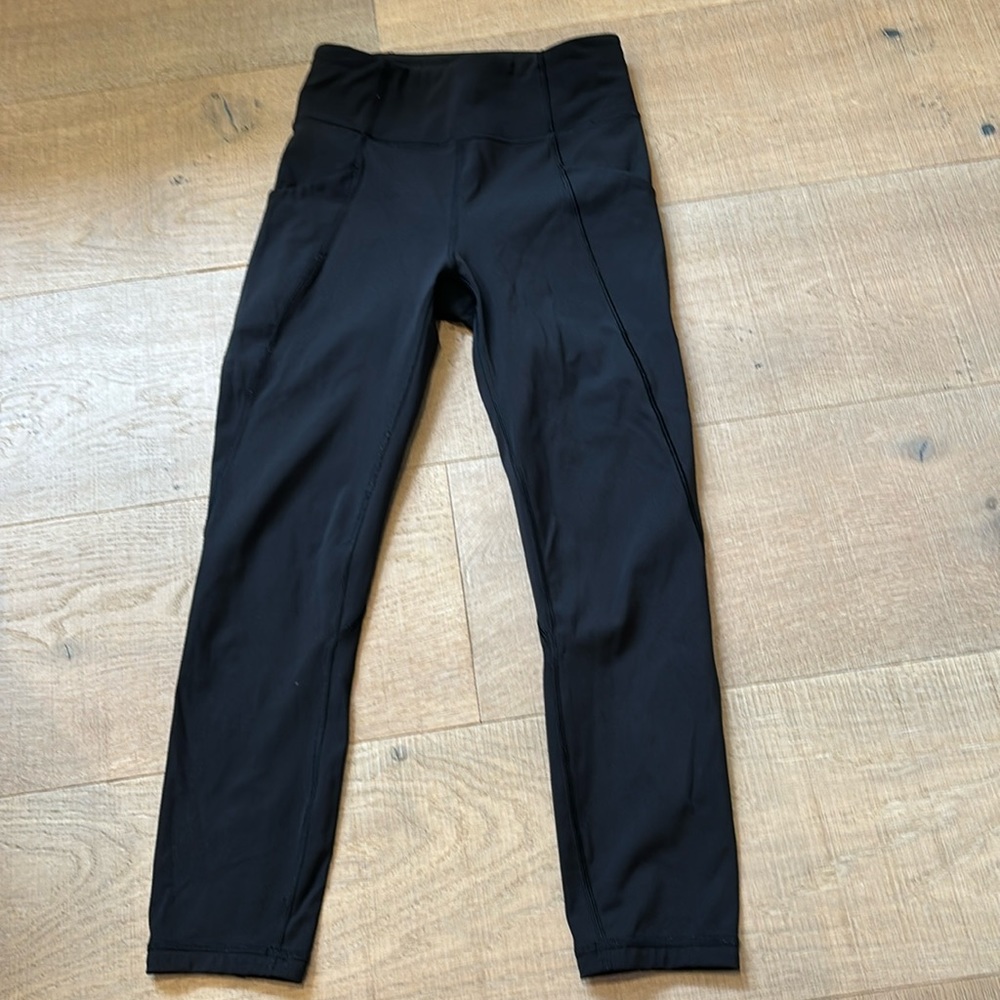 Lululemon black pants. Size 4. No rips. Snug & very fitted size 4.